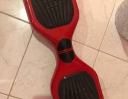 سكوتر  مع الشحن لون احمر فيه خدوش خفيفه